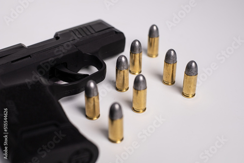 black gun and bullets
