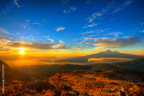 Volcanoes Iztaccihuatl and Popocatepetl seen from top Mount Tlaloc in Mexico central at sunrise photo