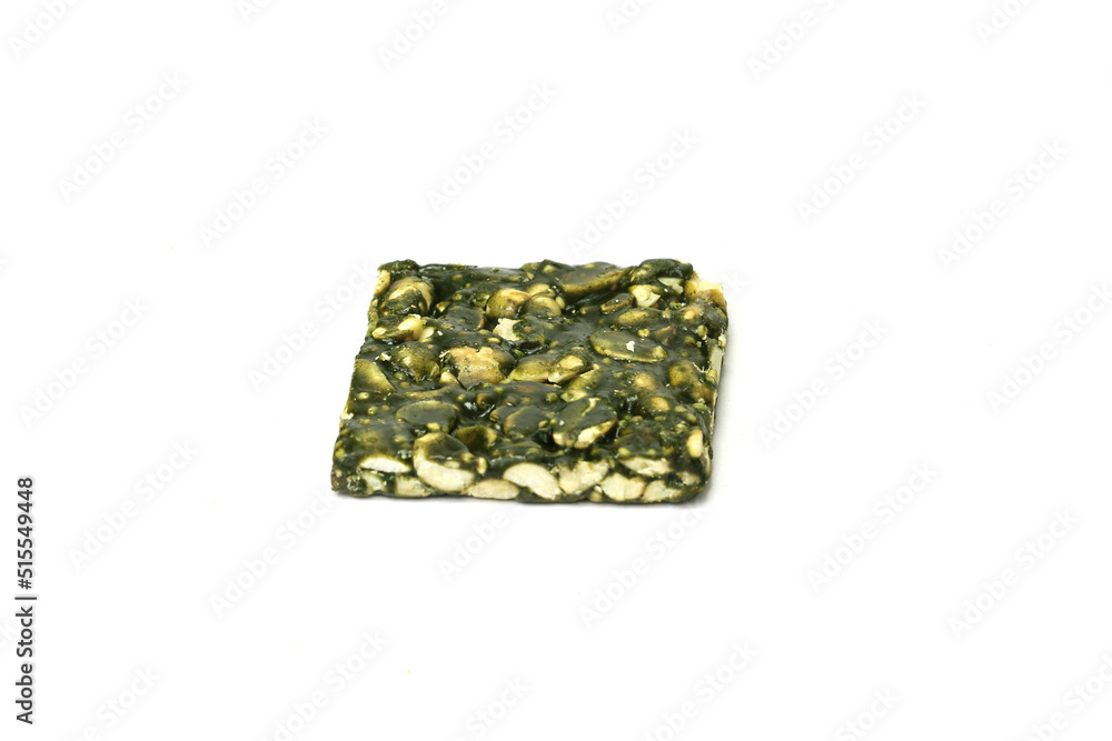 Peanut Spriluna brittle with sesame seeds and peanuts Isolated on white background Peanut Spriluna brittle with sesame seeds and peanuts Isolated on white background