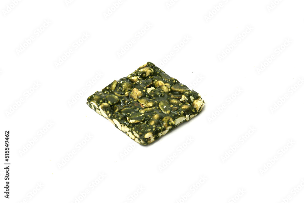 Peanut Spriluna brittle with spirulina powder and ground nuts Peanut Spriluna brittle with spirulina powder and ground nuts