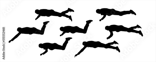 The guy lies in a horizontal position, his arms, and legs in different poses. The man lies on his stomach, trying to get something with his hand. Set of seven black male silhouettes isolated on white