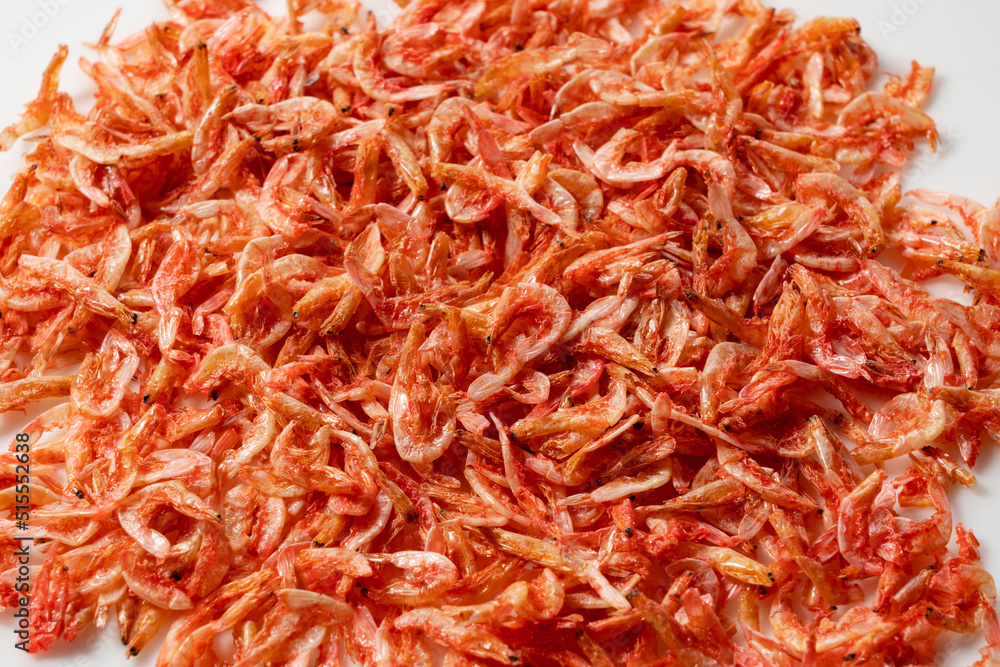 Dried sakura shrimps placed on a white background. Dried sakura shrimps placed on a white background.