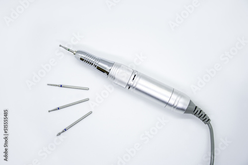 Wallpaper Mural Electric nail manicure file drill isolated white background Torontodigital.ca