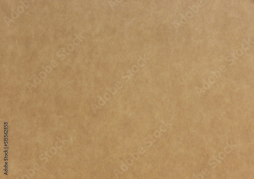 Vintage brown paper texture, horizontal top view. Craft paper background close up.