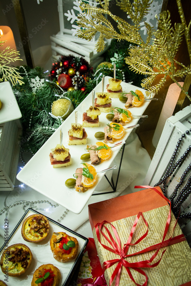 Fototapeta premium Mini snacks on the banquet table for a wedding