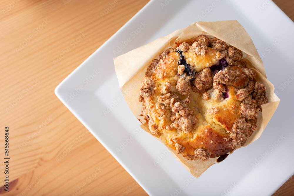 A top down view of a blueberry muffin. A top down view of a blueberry muffin.