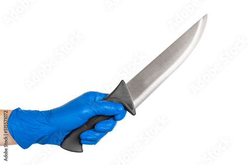 A hand in a blue medical glove holds a large knife.