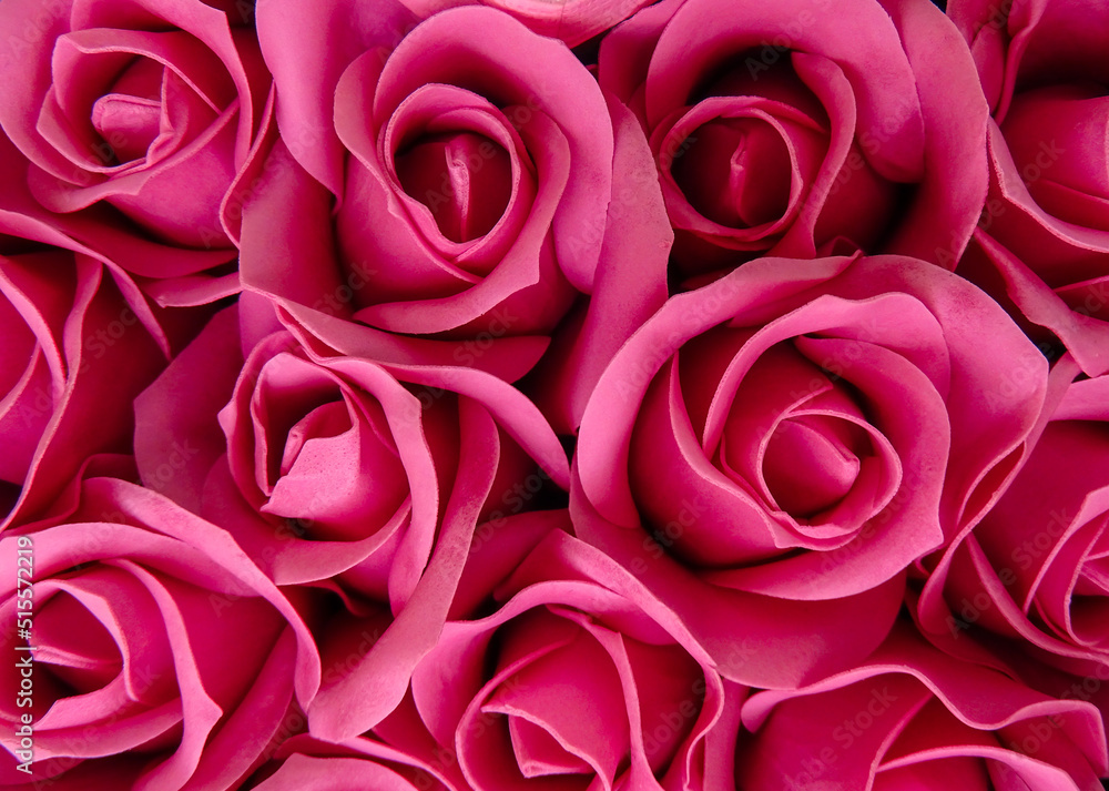 a wall of pink artificial roses a wall of pink artificial roses
