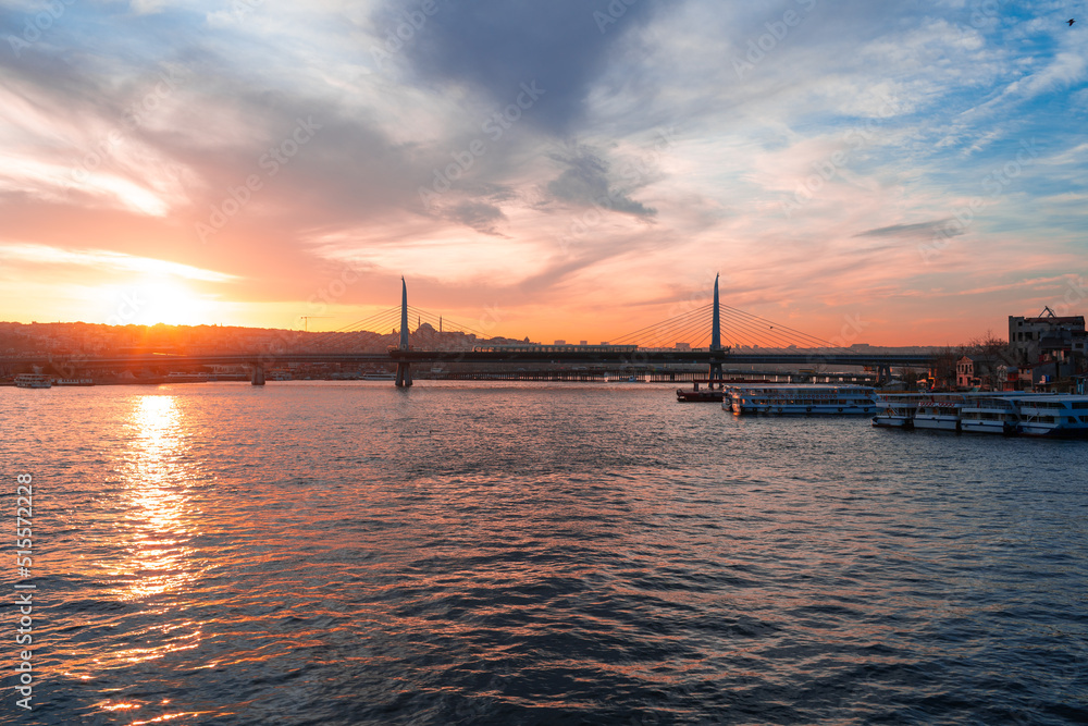 Boats in sea and scenic sunset in Istanbul