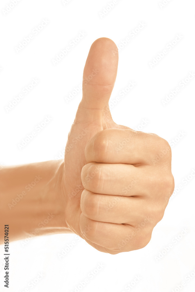 Male hand with thumb up isolated on white.