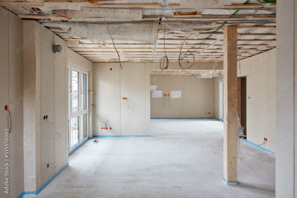 Laying screed in a room during house construction or renovation Laying screed in a room during house construction or renovation