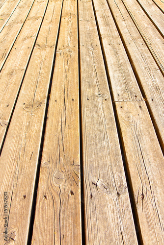 Old wooden floor slats for outdoor use stuck with metal nails