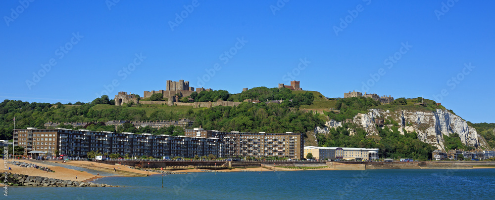 Panoramic view of Dover Castle and the town below, with the white cliffs of Dover and English Channel