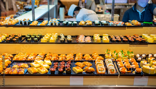 Sushi bar at restaurant. Sushi buffet, Japanese food that is loved by many nationalities and is healthy. 