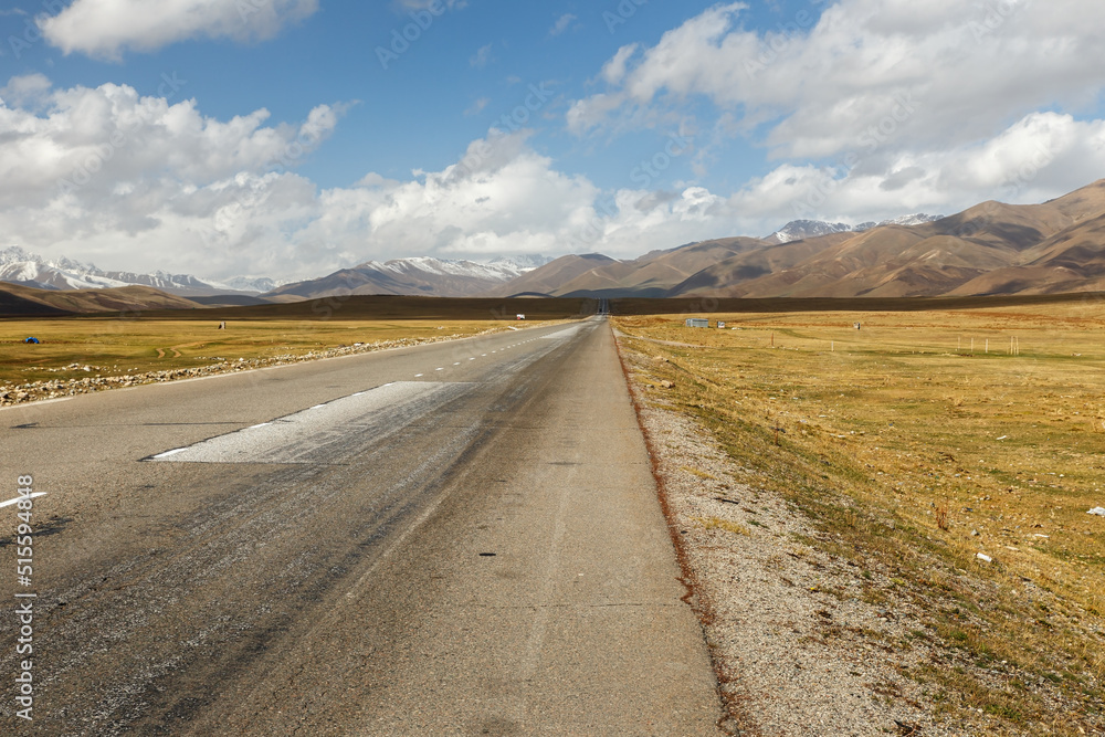 asphalt road, Bishkek Osh highway in Suusamyr valley of Kyrgyzstan.
