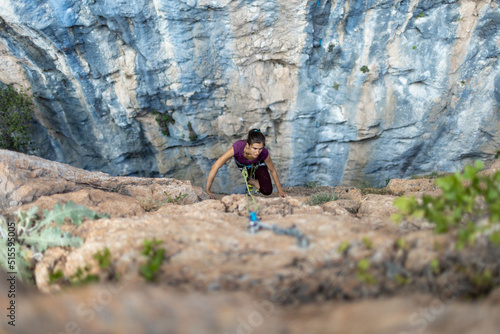 female rock climber © zhukovvvlad
