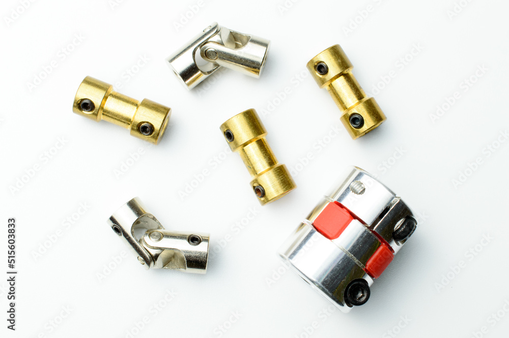 Set of a different couplings for RC model toys. On black background. Selective focus. Set of a different couplings for RC model toys. On black background. Selective focus.