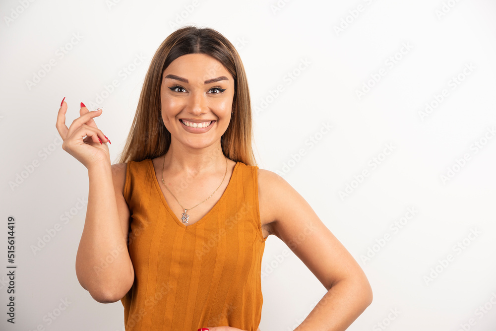 Positive woman posing on white background Positive woman posing on white background