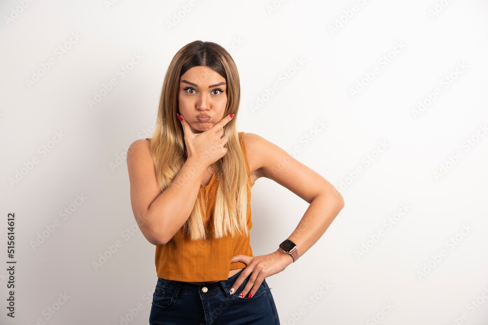 Pretty woman posing on white background Pretty woman posing on white background