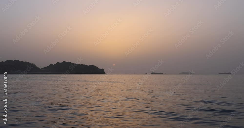 Evening Dhow boat cruise along the shoreline of Muscat in Oman Evening Dhow boat cruise along the shoreline of Muscat in Oman