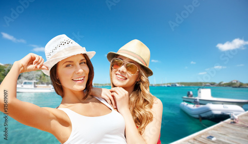Fotografie, Obraz travel, tourism and summer vacation concept - beautiful happy women or female fr