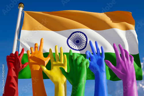 Rainbow colored hands from lgbt community over flag of India. Indian gay parade, concept of pride, freedom, elections, voting, rainbow flag, diversity. 3D rendering