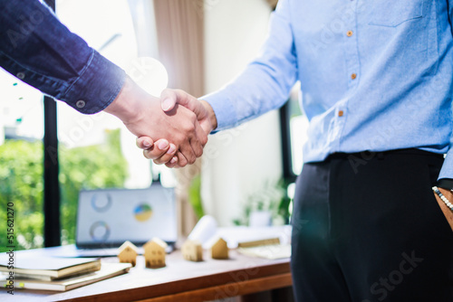 Real estate agent handshake, deal business. Business partnership meeting and home insurance