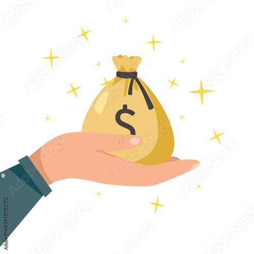 The hand holds a bag of money. The concept of winning, cash payout