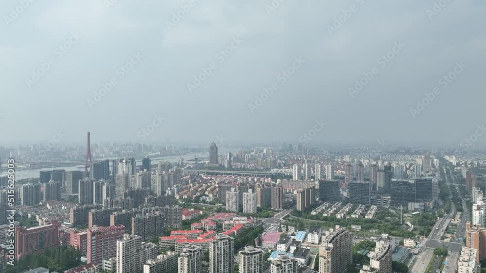 Construction site of skyscraper in city. Drone aerial view. Skyscraper in construction, cranes and downtown view Shanghai China. Industry, business, house development concept concept b-roll footage. Construction site of skyscraper in city. Drone aerial view. Skyscraper in construction, cranes and downtown view Shanghai China. Industry, business, house development concept concept b-roll footage.