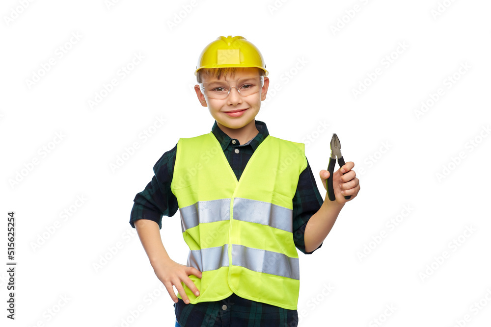building, construction and profession concept - happy smiling little boy in protective helmet and safety vest holding pliers over white background building, construction and profession concept - happy smiling little boy in protective helmet and safety vest holding pliers over white background