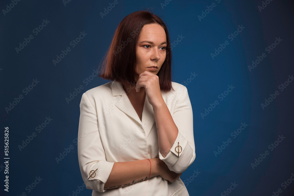 Young businesswoman in white blazer planning Young businesswoman in white blazer planning