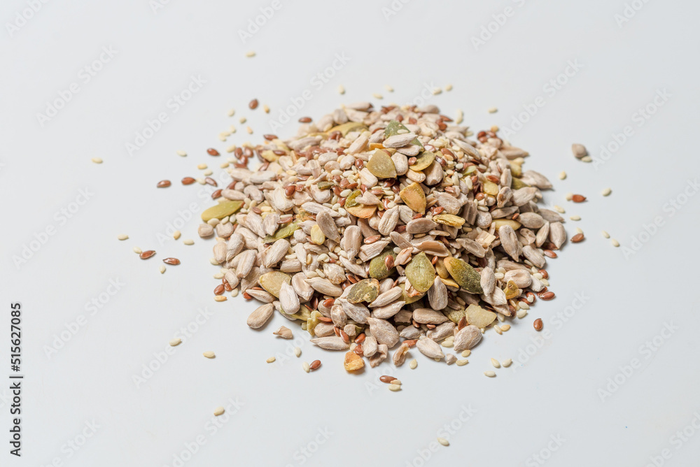 Mix of seeds for a salad. A pile of mixed seeds. Mix of seeds for a salad. A pile of mixed seeds.