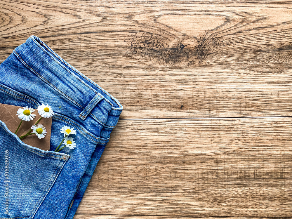 Jeans with daisies in pocket