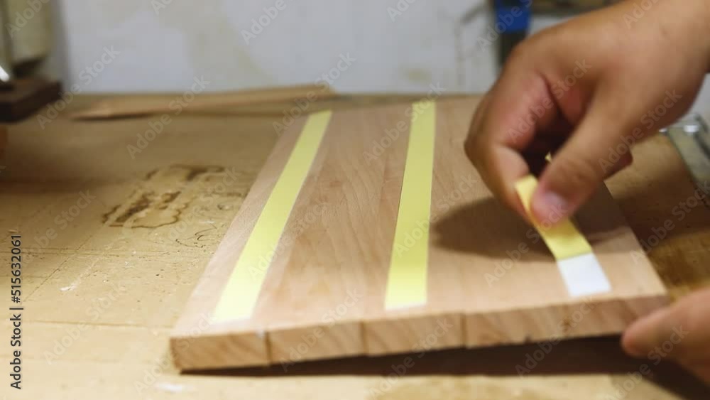 Preparing wooden board for cutting on the cnc machine. Preparing wooden board for cutting on the cnc machine.
