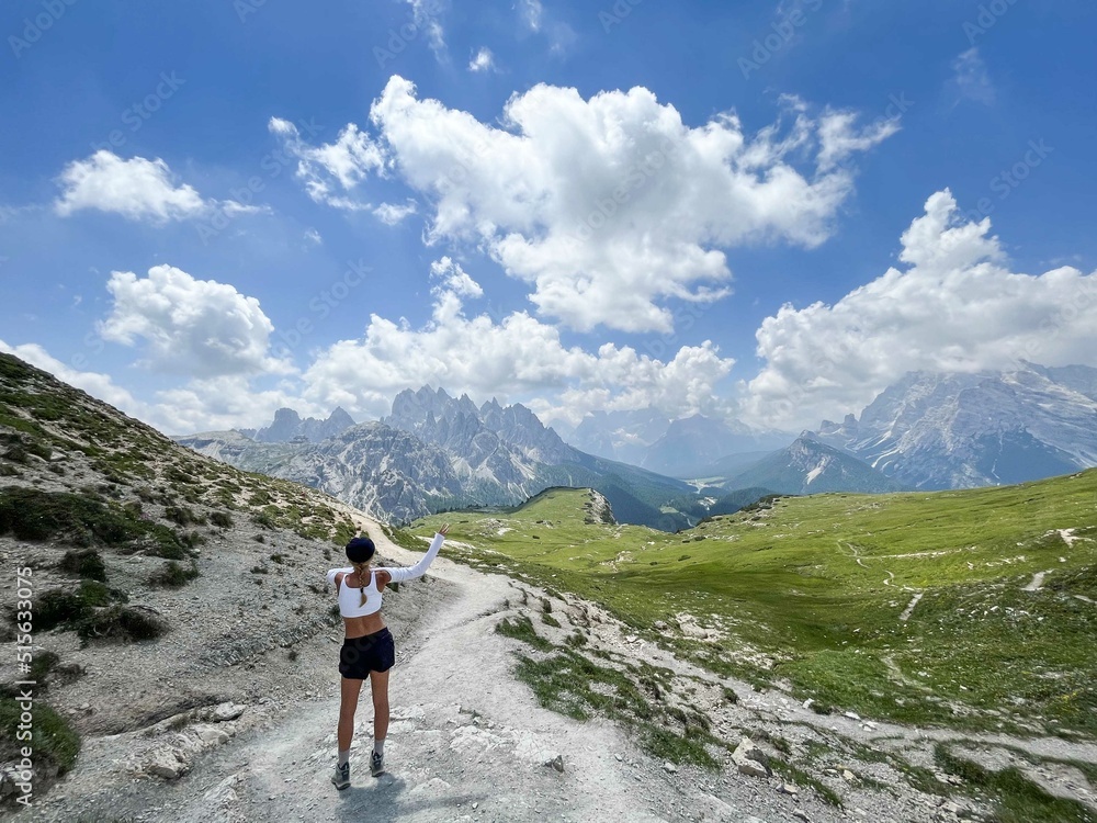 Woman hiking in the Dolomite mountains