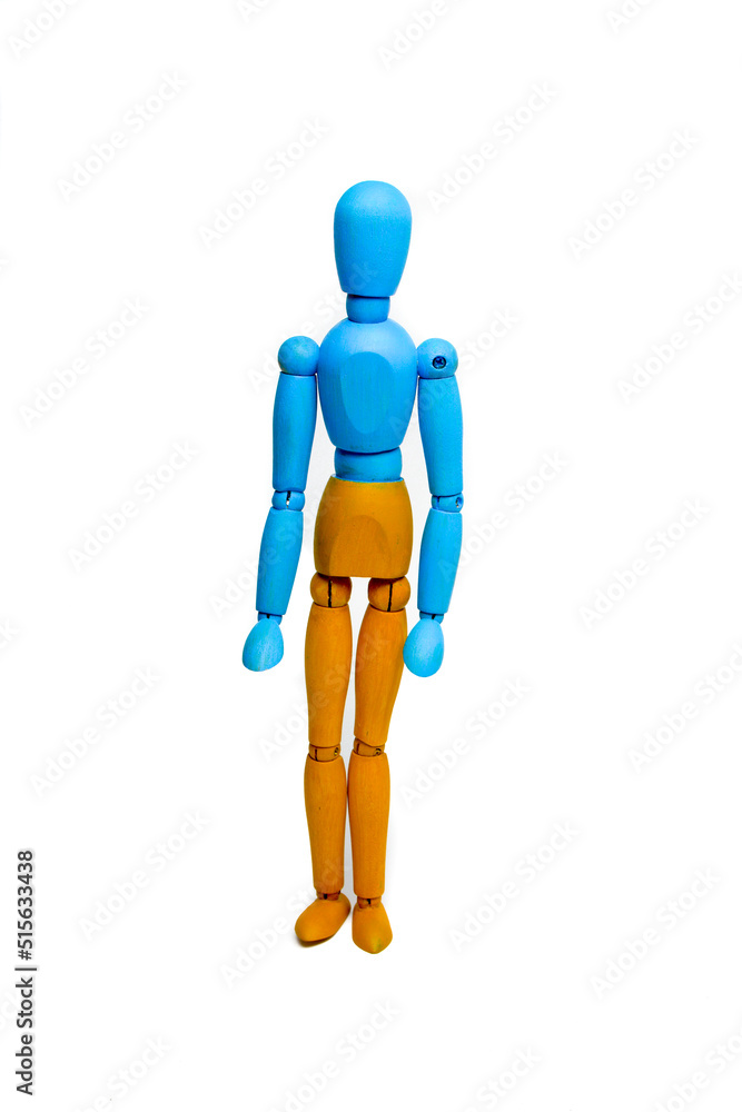 Wooden doll of Ukrainian flag colors, on gray background Wooden doll of Ukrainian flag colors, on gray background
