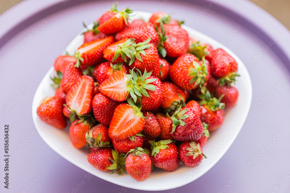 Fresh ripe delicious strawberries in bowl - healthy food and vegetarian Fresh ripe delicious strawberries in bowl - healthy food and vegetarian