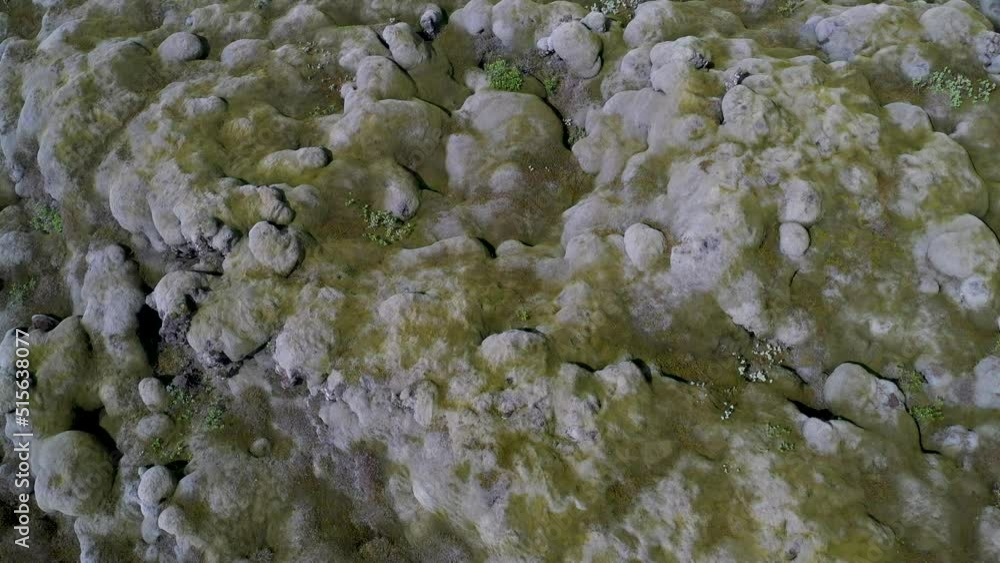 Moss covered rocks in Iceland with drone video from above. Moss covered rocks in Iceland with drone video from above.