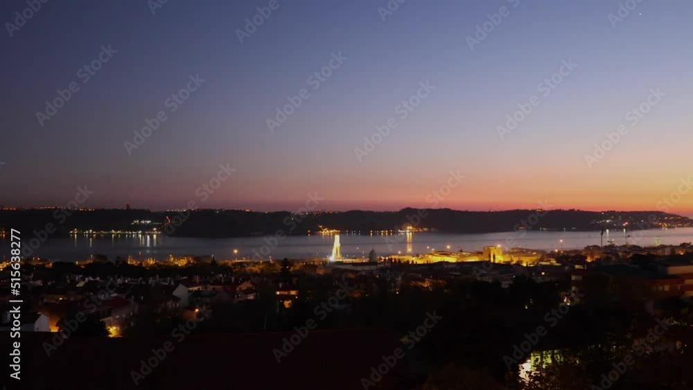 Lisbon Traditional Architecture Buildings at Hills Cityscape at Night Portugal with Tagus river in background Lisbon Traditional Architecture Buildings at Hills Cityscape at Night Portugal with Tagus river in background