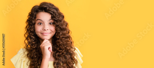 smiling teen girl with long curly hair and perfect skin, beauty. Child face, horizontal poster, teenager girl isolated portrait, banner with copy space.