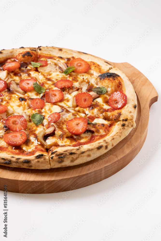 pizza with strawberries on a white background