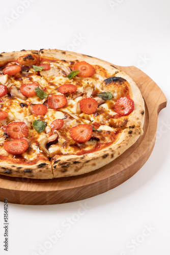 pizza with strawberries on a white background