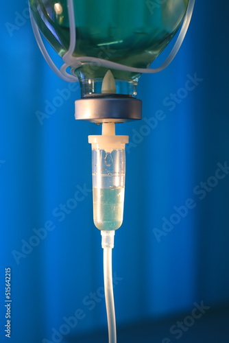 Set iv fluid intravenous drop saline drip hospital room,Medical Concept,treatment emergency and injection drug infusion care chemotherapy, concept.blue light background