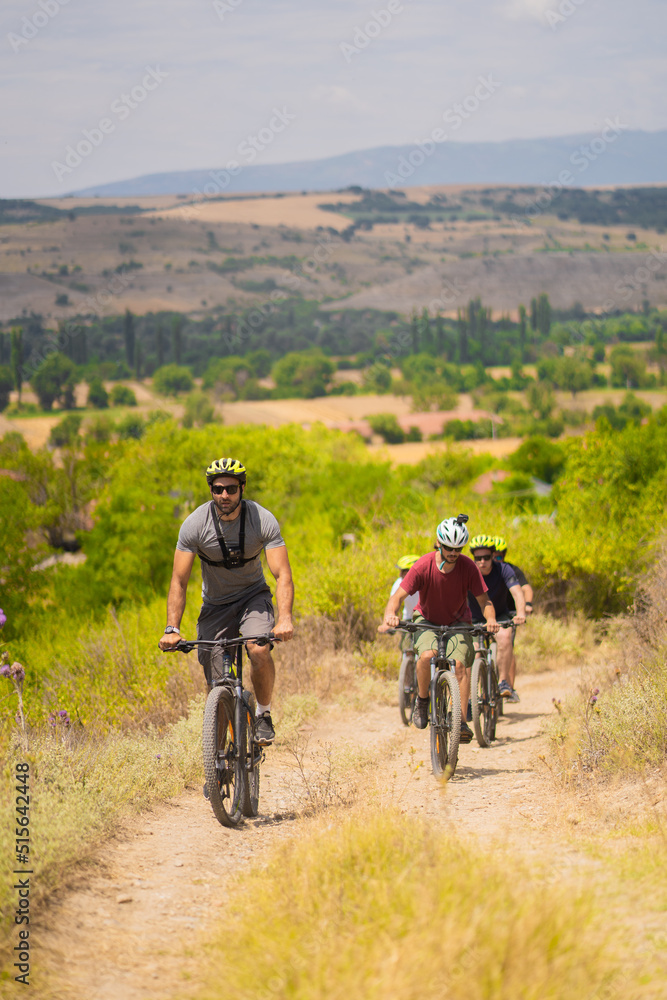 Naklejka premium Riding bikes together