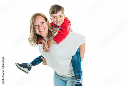 Fotografie cute five year old boy studio portrait on white background with mother holding t