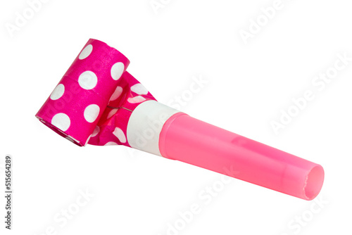 Pink noisemaker party whistle horn on the white isolated background