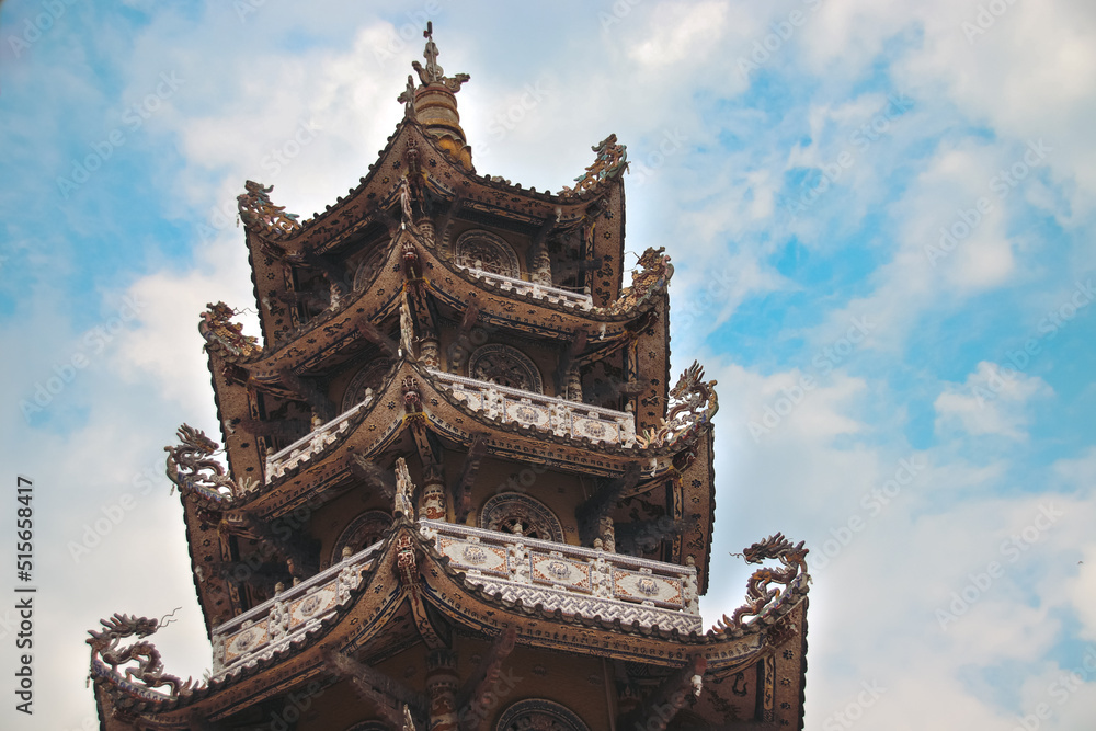 Dai Hong Chung tower in Linh Phuoc Pagoda in Da lat, Vetnam shot in low angle