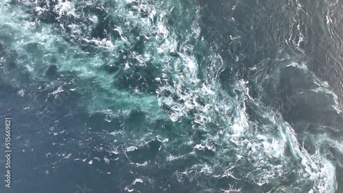 Overhead view of strong current flowing through open water