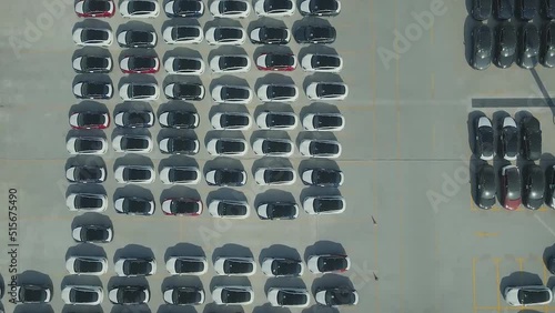 Al Jubail is a port city in Saudi Arabia, located on the Persian Gulf. Aerial view of new tesla cars in the port. photo