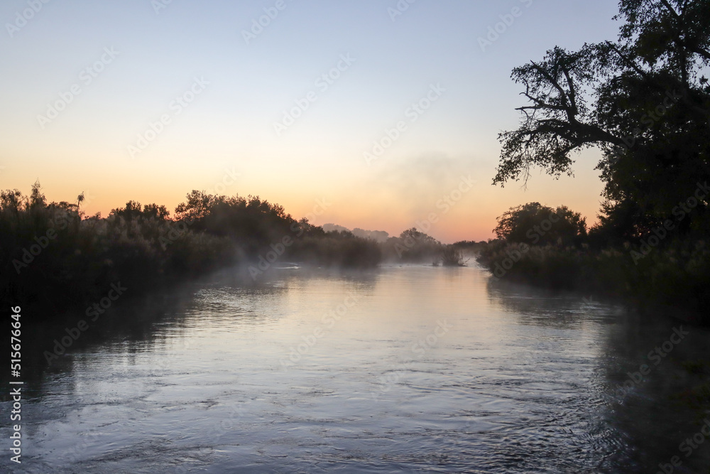 Kruger National Park, South Africa: misty morning on the Sabie River Kruger National Park, South Africa: misty morning on the Sabie River